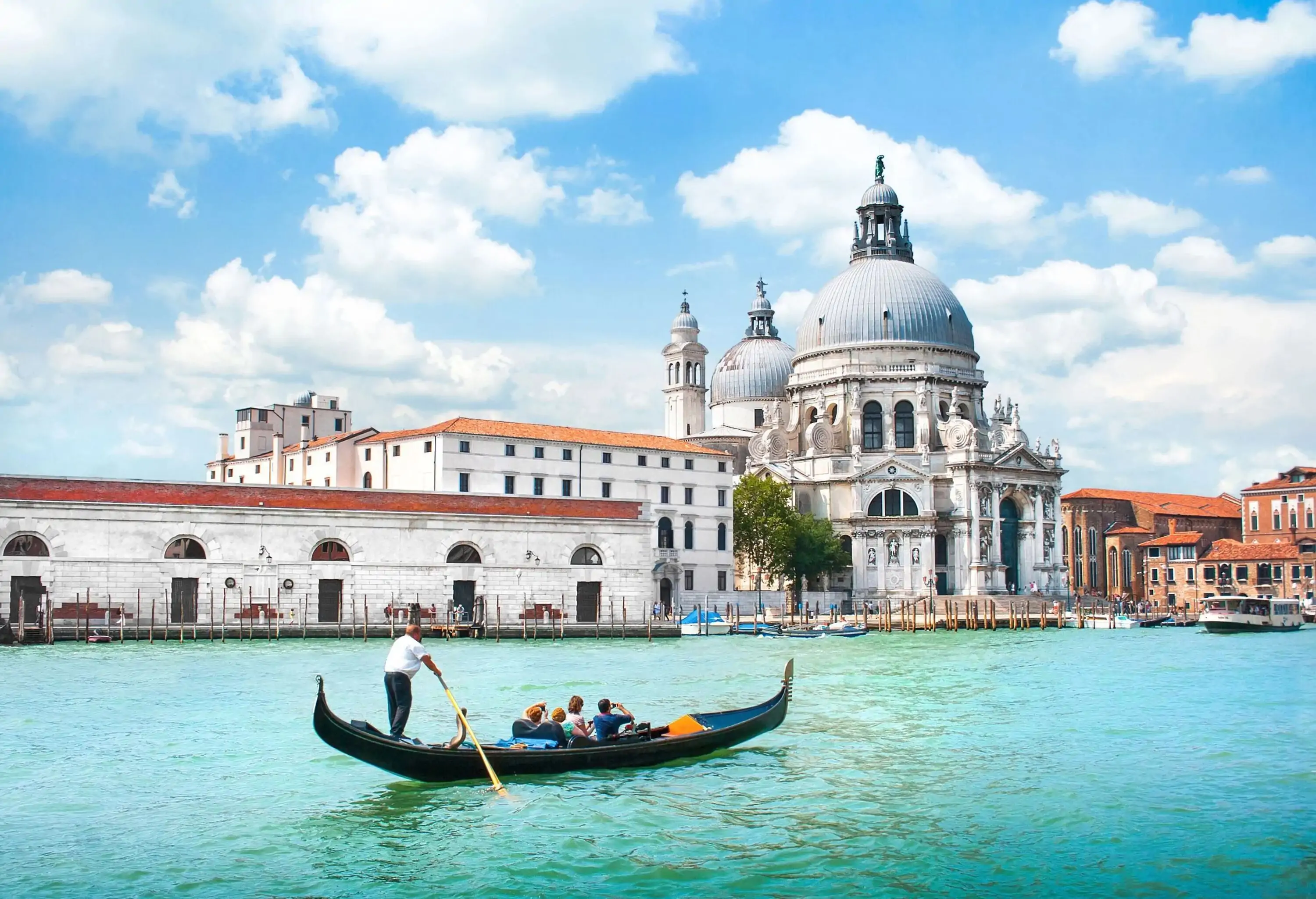 Gondola on Canal Grande with Basilica di Santa Maria della Salute in the background, Venice, Italy