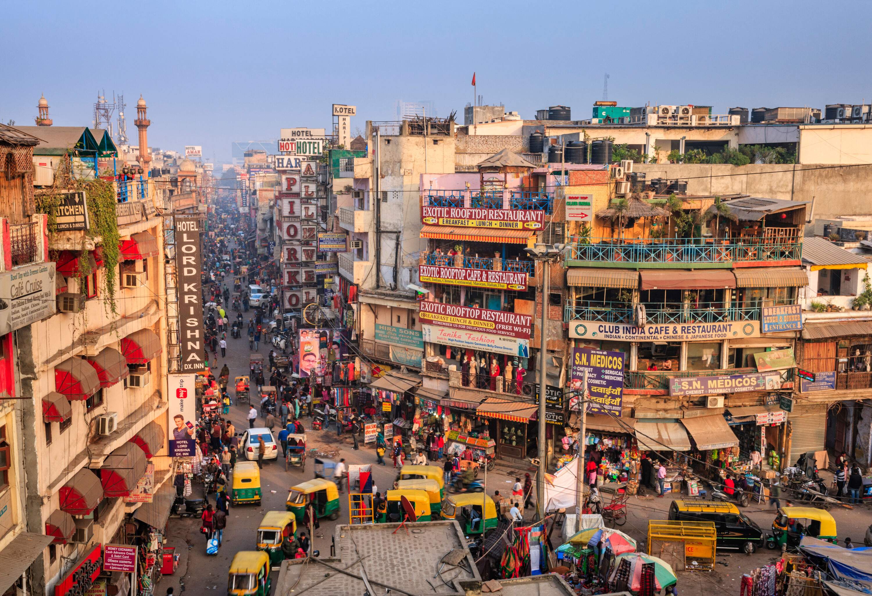 Top view of a crowded bazaar in the centre of old buildings.