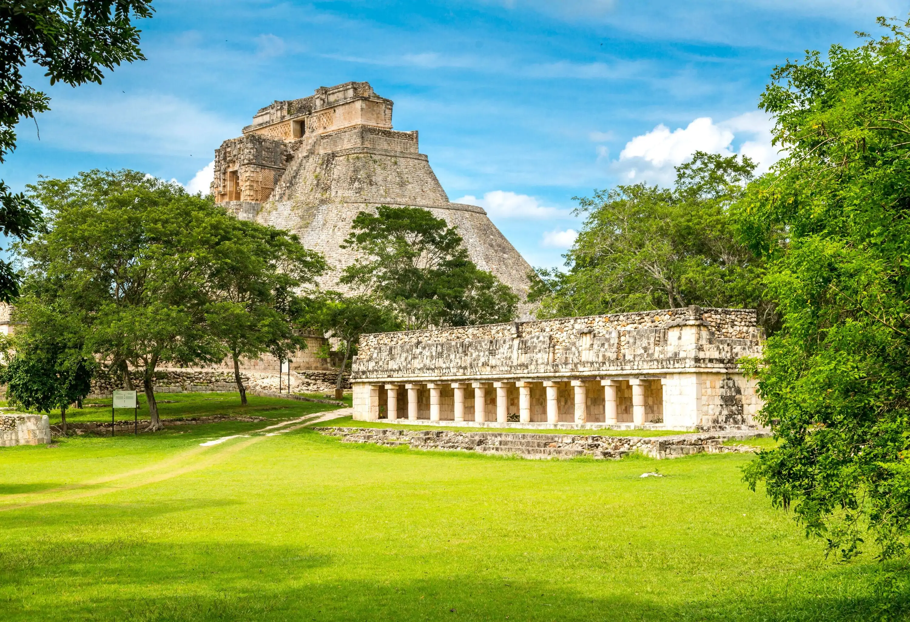 The Pyramid of the Magician, an astonishing and towering edifice located within the ancient Maya metropolis, shows remarkable architectural design and detailed features that demonstrate the Maya people's superb workmanship and resourcefulness.