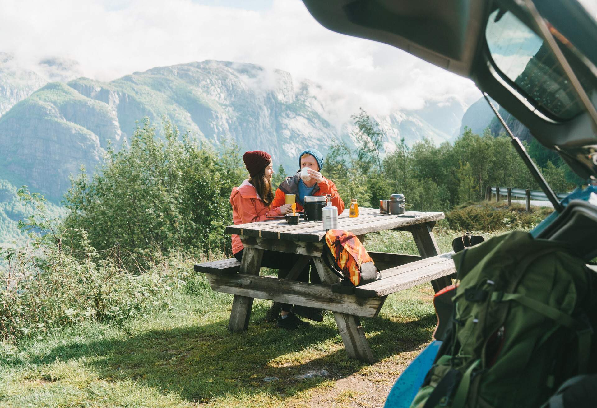 dest_norway_bergen_theme_car_food_roadtrip_couple_snacks_gettyimages-698534222_universal_within-usage-period_83128