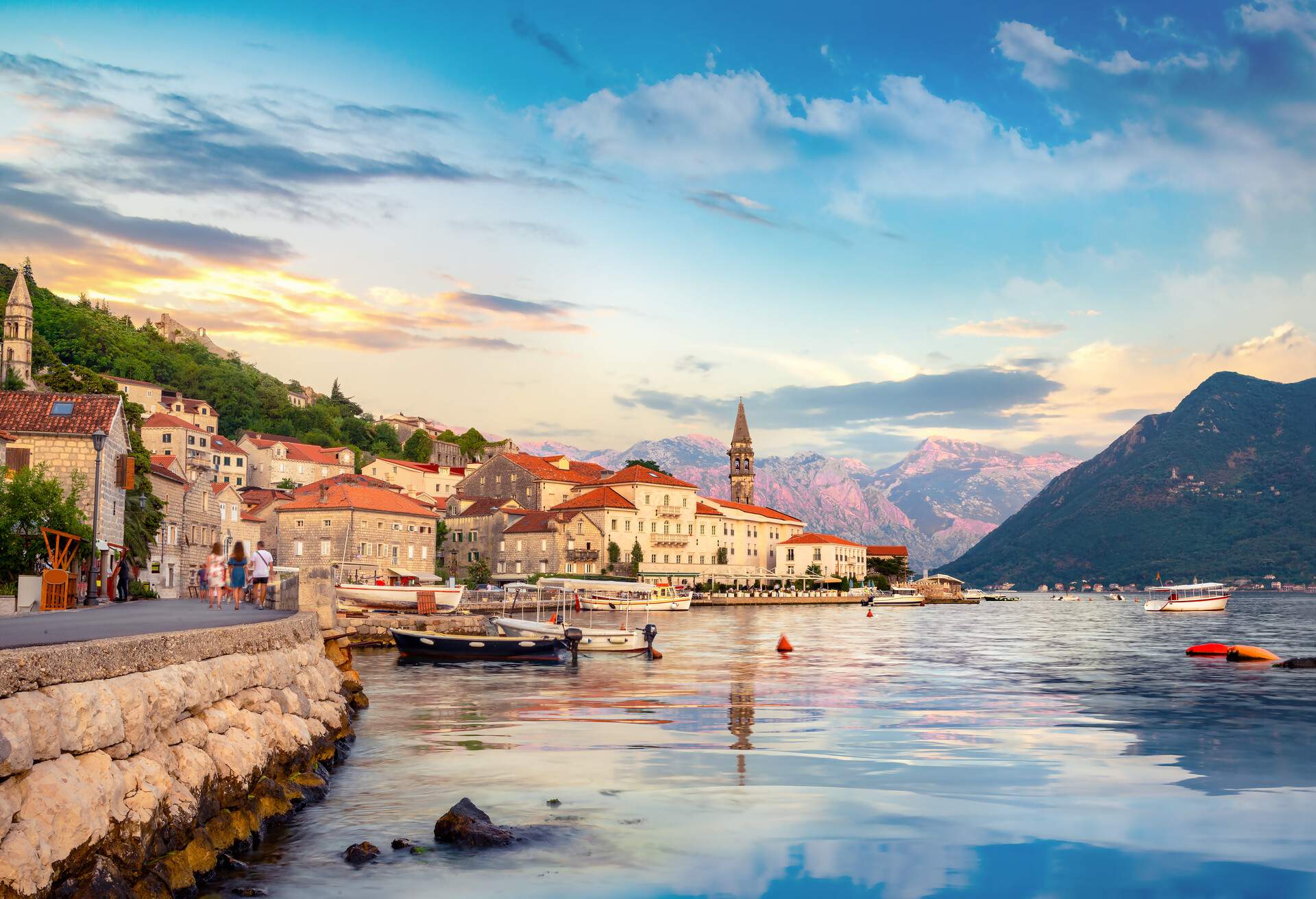 Historic city of Perast in the Bay of Kotor in summer at sunset