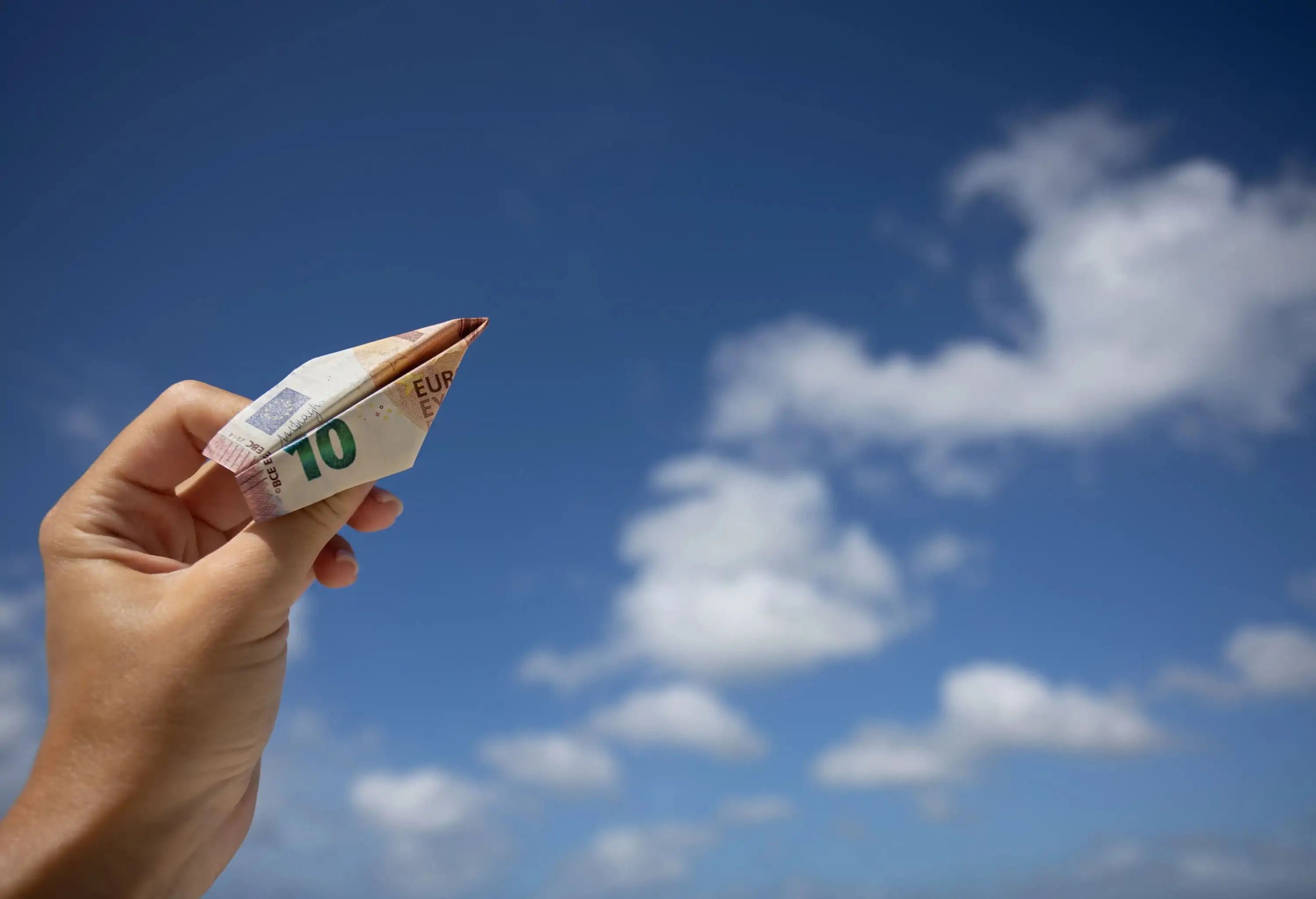 Euro bank note on the clear blue sky